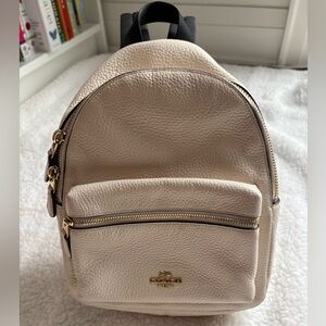 Coach Mini Charlie Backpack in cream/chalk pebble leather